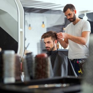 a barber giving a haircut