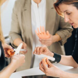 img of students learning manicures
